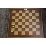 A VINTAGE WOODEN CHESS BOARD