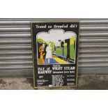 A FRAMED AND GLAZED REPRODUCTION ISLE OF WIGHT STEAM RAILWAY POSTER