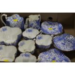 AN ANTIQUE BLUE AND GILT PART TEA SERVICE RD 92158 .