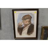 A FRAMED AND GLAZED NORTHERN INDUSTRIAL SCHOOL STYLE PASTEL PORTRAIT OF A MAN IN A FLAT CAP