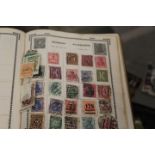 A STAMP ALBUM AND CONTENTS