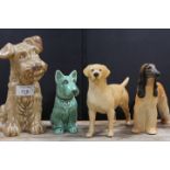FOUR DOG FIGURES TO INCLUDE A BESWICK AFGHAN HOUND, BESWICK GOLDEN LABRADOR AND TWO SYLVAC DOGS