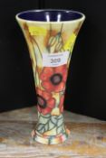 AN OLD TUPTONWARE TRUMPET VASE DECORATED WITH POPPIES