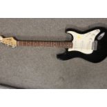 A FENDER SQUIRE STRAT ELECTRIC GUITAR