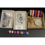A SMALL SELECTION OF MEDALS, RIBBONS, BADGES ETC