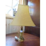 A TRADITIONAL BRASS TABLE LAMP WITH SHADE
