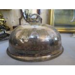 AN ANTIQUE LARGE SILVER PLATED SERVING DOME WITH ENGRAVED ARMORIAL DETAIL, W 41 cm