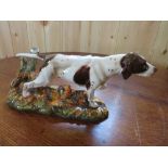 A ROYAL DOULTON FIGURE OF A SPANIEL, HN 2624