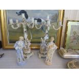 A LARGE PAIR OF CONTINENTAL PORCELAIN FIGURATIVE FIVE BRANCH CANDELABRA - H 49 cm, TOGETHER WITH A