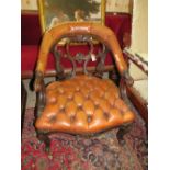 A QUALITY VICTORIAN CARVED OAK LEATHER UPHOLSTERED CLUB CHAIR