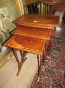 A 20TH CENTURY MAHOGANY QUARTETTO OF TABLES, RAISED ON SLENDER TURNED SUPPORTS, LARGEST H 59 cm, W