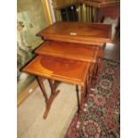 A 20TH CENTURY MAHOGANY QUARTETTO OF TABLES, RAISED ON SLENDER TURNED SUPPORTS, LARGEST H 59 cm, W