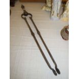 A SET OF GEORGIAN STEEL FIRE TONGS, L 73 cm