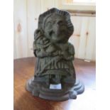 A LATE 19TH CENTURY CAST 'MRS PUNCH' DOORSTOP, H 26.5 cm