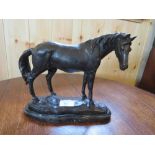A MODERN BRONZED STUDY OF A STANDING HORSE ON NATURALISTIC BASE, H 22 cm, W 23 cm