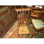 A VINTAGE OAK WICKER SEAT PRAYER CHAIR