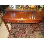 A 19TH CENTURY MAHOGANY TWO DRAWER SIDE TABLE RAISED ON TURNED SUPPORTS, W 101 cm