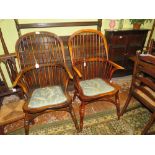 A PAIR OF REPRODUCTION WINDSOR STYLE ARMCHAIRS, each with upholstered seats (2)