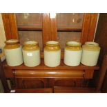 A COLLECTION OF FIVE GLAZED STONEWARE JARS