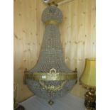 A LARGE 20TH CENTURY GILT EMPIRE STYLE TENT & BAG CHANDELIER, of French influence, with glass beads,