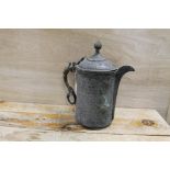 A MIDDLE EASTERN STYLE METAL TANKARD
