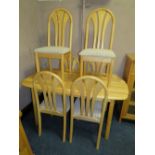 A MODERN BEECH KITCHEN TABLE AND SIX CHAIRS