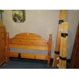 A MODERN HONEY PINE DOUBLE BED FRAME