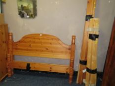 A MODERN HONEY PINE DOUBLE BED FRAME