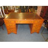 A 20TH CENTURY YEW LEATHER TOPPED TWIN PEDESTAL DESK H-77 W-152 D-90 CM