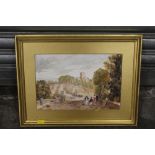 A GILT FRAMED WATERCOLOUR OF A VILLAGE SCENE