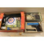 A BOXED AIRSOFT PISTOL , TARGETS ETC AND WEBBING BELT