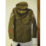 AN ARMY OFFICER JACKET AND HAT