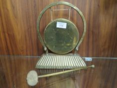 A BRASS TABLE GONG & STRIKER