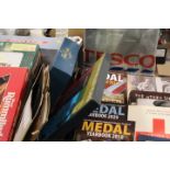 A COLLECTION OF MOSTLY WAR RELATED COLLECTABLES TO INCLUDE BOOKS AND DVD'S