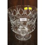 A LARGE CUT GLASS FOOTED BOWL