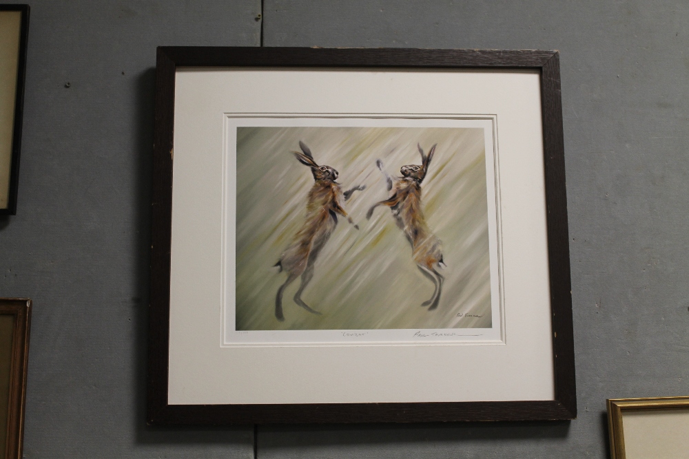 A FRAMED SIGNED LIMITED EDITION PRINT OF BOXING HARES ENTITLED 'COMBAT' NO 113/225 BY PAUL TAVERNOR