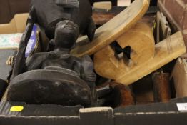 A TRAY OF CARVED WOODEN TRIBAL ITEMS, HEAD REST ETC