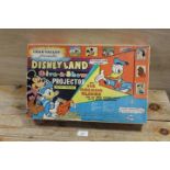 A BOXED CHAD VALLEY DISNEYLAND GIVE A SHOW PROJECTOR WITH SLIDES - NOT TESTED