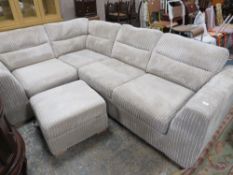 A LARGE MODERN UPHOLSTERED CORNER SUITE WITH STOOL