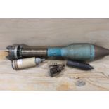 AN INERT 1950s RUSSIAN TRAINING BAZOOKA SHELL TOGETHER WITH AN ASSORTMENT OF MORTAR PARTS