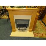 A MODERN 'KATELL' ELECTRIC FIRE AND SURROUND