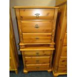 A PAIR OF MODERN HONEY PINE BEDSIDE CHESTS (2)