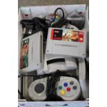 A NINTENDO 'SUPER NINTENDO' ENTERTAINMENT SYSTEM TOGETHER WITH ASSORTED GAMES TO INCLUDE HOME