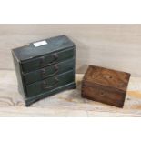 A VINTAGE MINIATURE CHEST OF DRAWERS TOGETHER WITH A WOODEN MONEY BOX INSCRIBED 1937 (2)