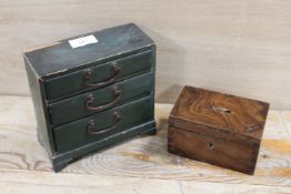 A VINTAGE MINIATURE CHEST OF DRAWERS TOGETHER WITH A WOODEN MONEY BOX INSCRIBED 1937 (2)