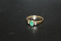 A HALLMARKED 9CT GOLD EMERALD AND DIAMOND RING - APPROX WEIGHT 2.4 G - RING SIZE Q