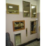 A COLLECTION OF SEVEN ASSORTED WALL MIRRORS