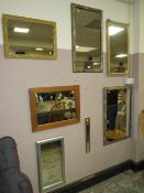 A COLLECTION OF SEVEN ASSORTED WALL MIRRORS