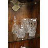 TWO LARGE CUT GLASS VASES A JUG AND A DECANTER