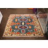 A VINTAGE WOOLEN RUG